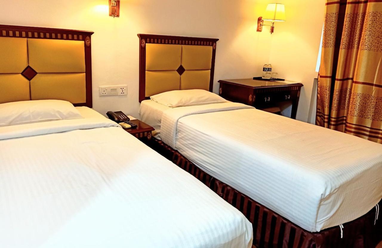 Super Oyo 90464 Borneo Suites Hotel كوتا كينابالو المظهر الخارجي الصورة