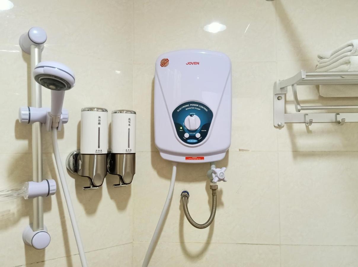 Super Oyo 90464 Borneo Suites Hotel كوتا كينابالو المظهر الخارجي الصورة