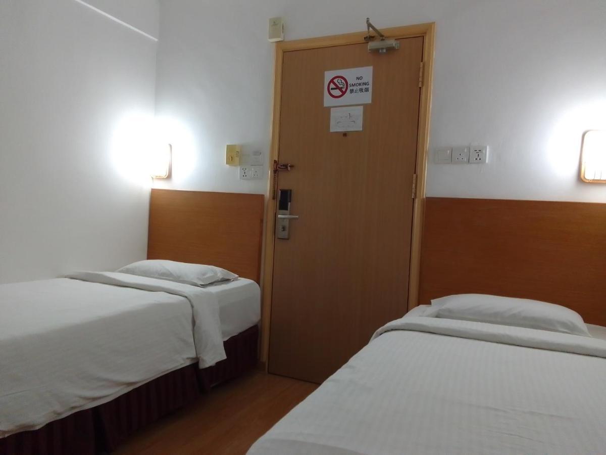 Super Oyo 90464 Borneo Suites Hotel كوتا كينابالو المظهر الخارجي الصورة