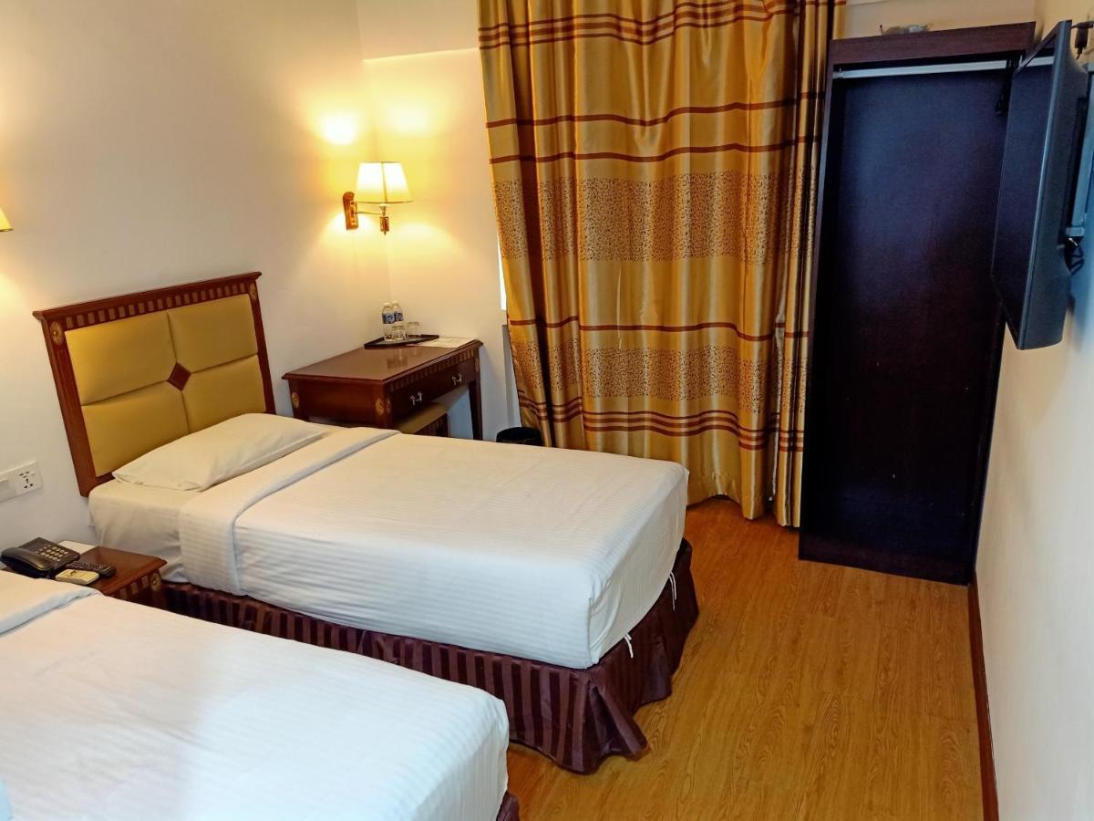 Super Oyo 90464 Borneo Suites Hotel كوتا كينابالو المظهر الخارجي الصورة