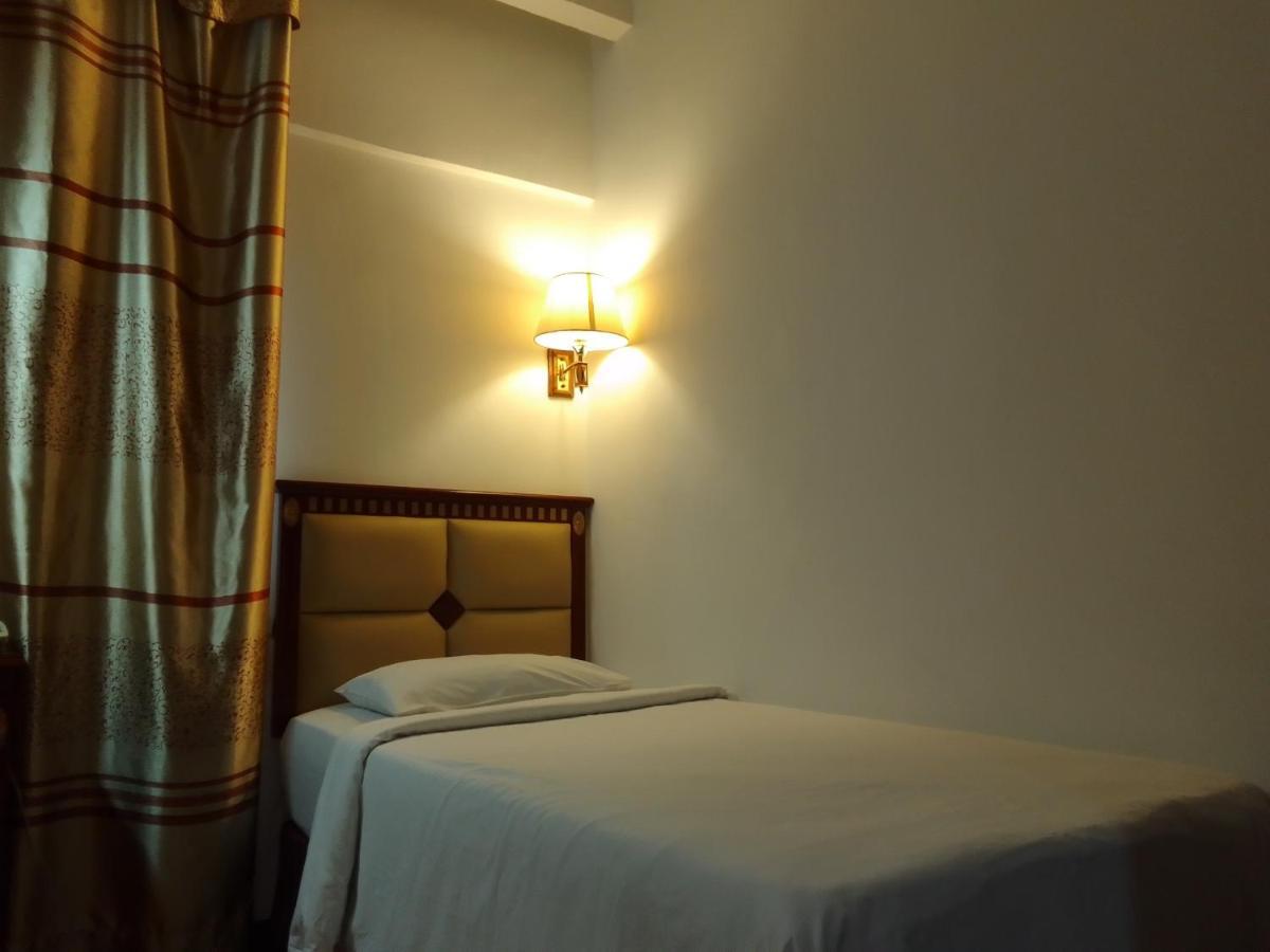Super Oyo 90464 Borneo Suites Hotel كوتا كينابالو المظهر الخارجي الصورة