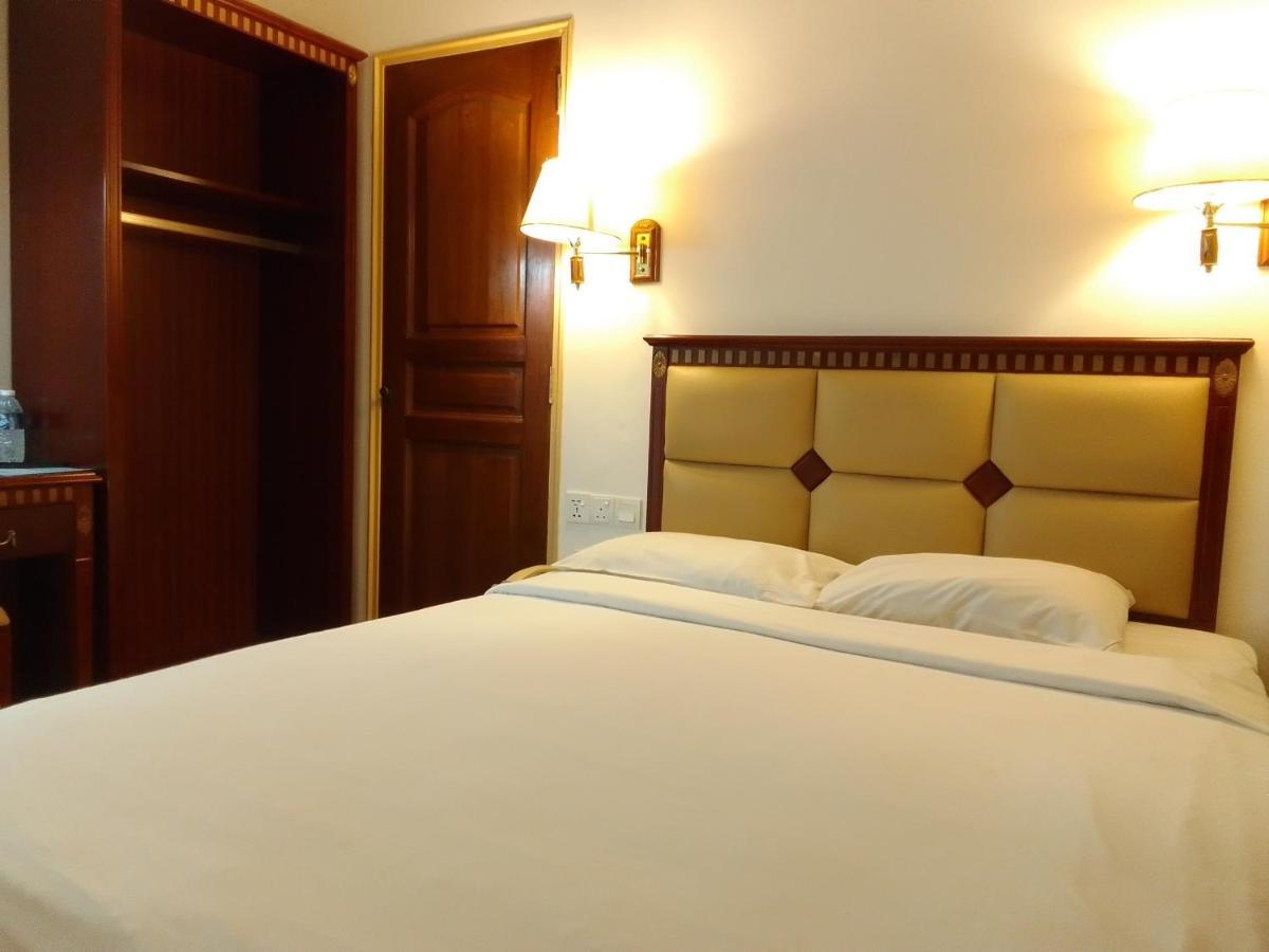 Super Oyo 90464 Borneo Suites Hotel كوتا كينابالو المظهر الخارجي الصورة