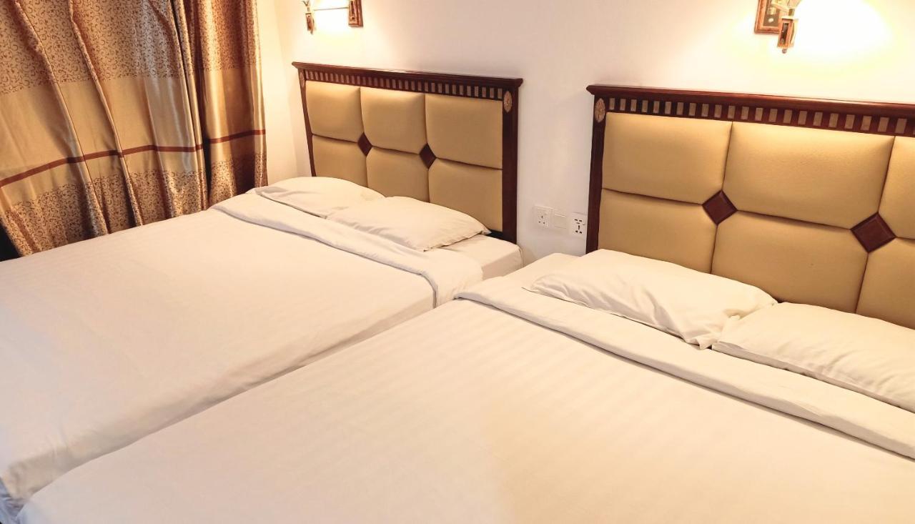Super Oyo 90464 Borneo Suites Hotel كوتا كينابالو المظهر الخارجي الصورة