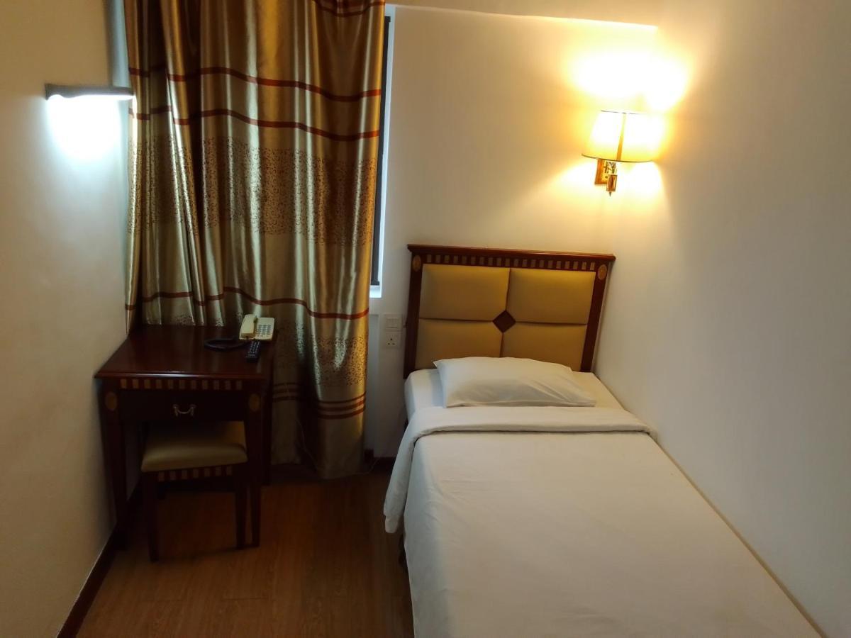 Super Oyo 90464 Borneo Suites Hotel كوتا كينابالو المظهر الخارجي الصورة