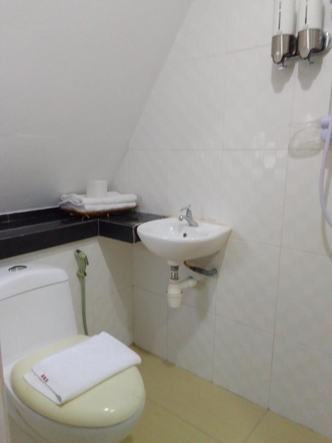 Super Oyo 90464 Borneo Suites Hotel كوتا كينابالو المظهر الخارجي الصورة