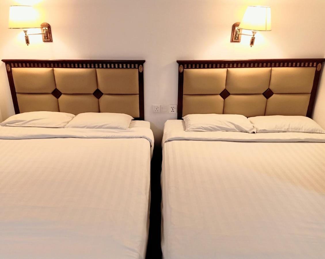 Super Oyo 90464 Borneo Suites Hotel كوتا كينابالو المظهر الخارجي الصورة