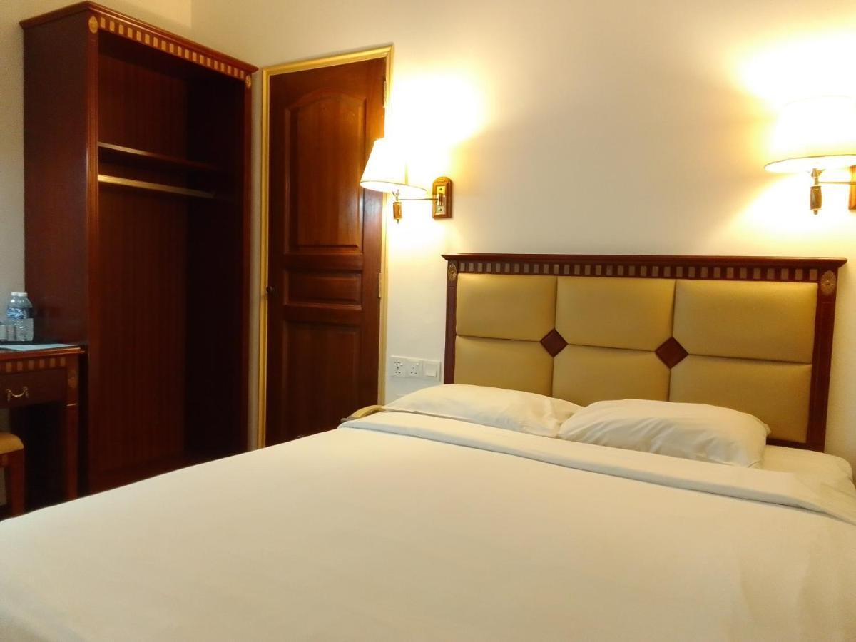 Super Oyo 90464 Borneo Suites Hotel كوتا كينابالو المظهر الخارجي الصورة