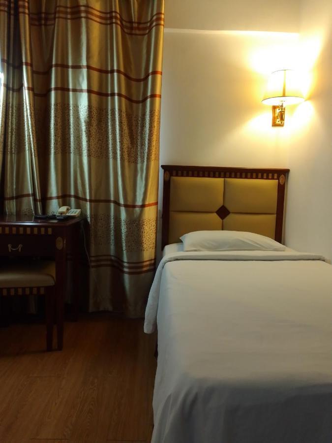 Super Oyo 90464 Borneo Suites Hotel كوتا كينابالو المظهر الخارجي الصورة