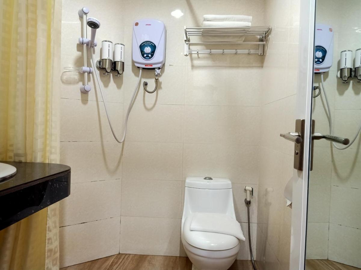 Super Oyo 90464 Borneo Suites Hotel كوتا كينابالو المظهر الخارجي الصورة
