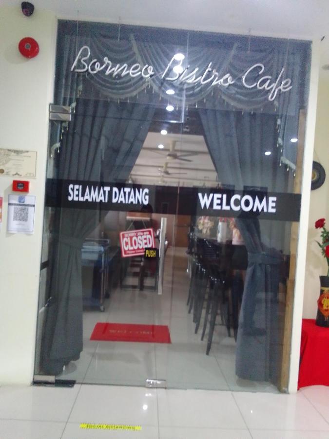Super Oyo 90464 Borneo Suites Hotel كوتا كينابالو المظهر الخارجي الصورة